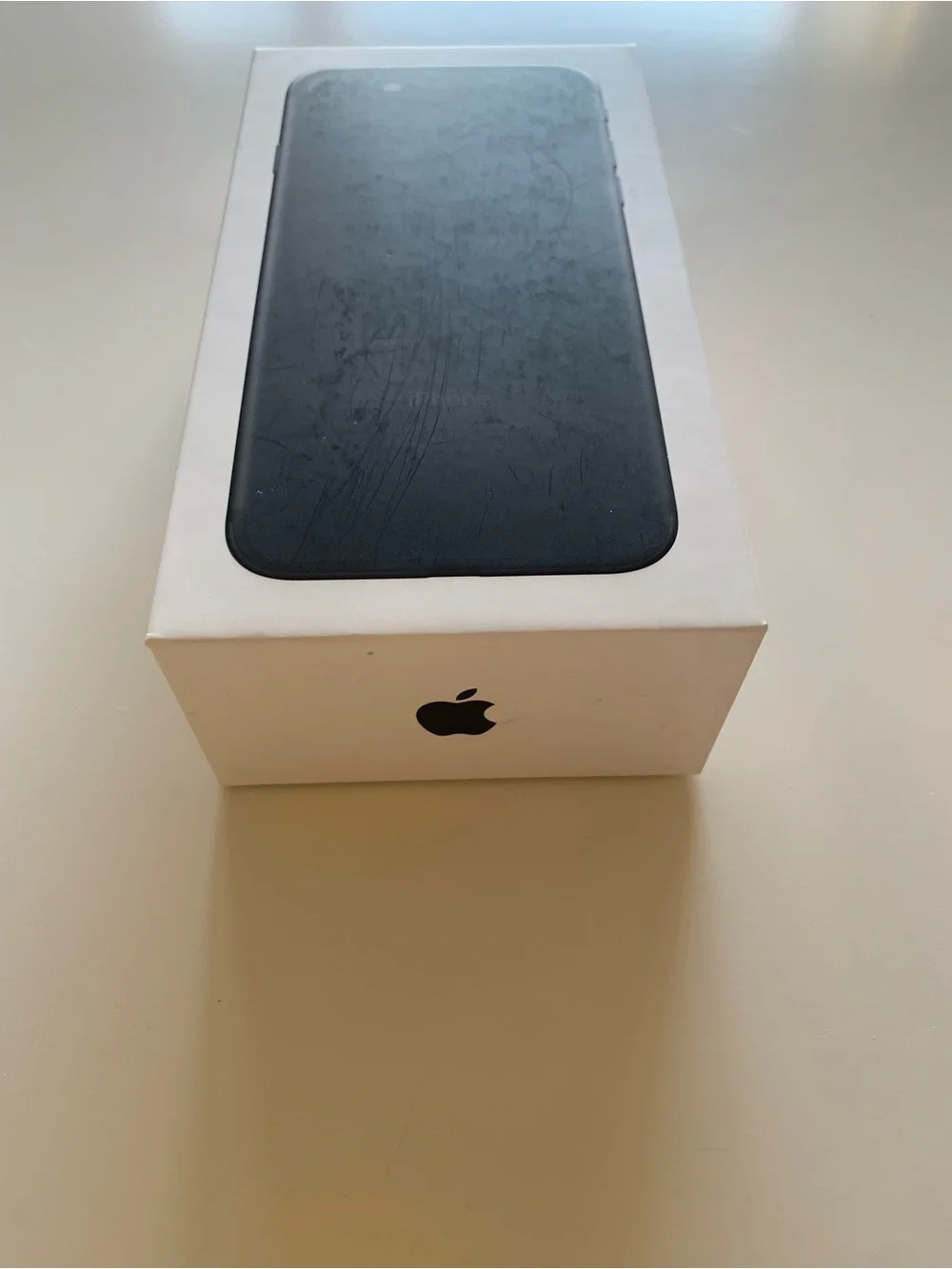 Empty iPhone 7 Box and Apple Stickers